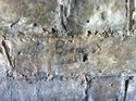 Thumbnail of Church Farm House (Church Street, Rodmersham, Sittingbourne, Swale, Kent), graffiti of names military numbers relating to Royal Dublin Fusiliers on wall and wooden door of a barn. Name BYRNE and number.