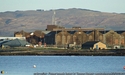 Thumbnail of Royal Naval Torpedo Factory (Eldon Street, Fort Matilda, Gourock, Inverclyde), the surviving buildings of larger complex comprise multi-bay brick single storey factory units. North elevation.