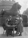 Thumbnail of The Womens Army Auxilliary Corps recruiting sergeants taking details from recruits in Trafalgar Square, 1918. IWM (Q 31082).