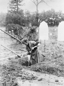 Thumbnail of Mrs Kitchener, a female gravedigger, carries on her husband's business whilst he serves on the front, Aley Green Cemetery, Luton. IWM (Q 31236).