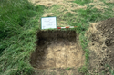 Thumbnail of Test Pit 20 after excavation (scale 50cm)