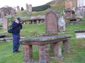 Thumbnail of George Wishart taking photographs of the tablestone grave dedicated to Samuel Herries, 1713 to 1793, Kirkcudbright Kirkyard. <br/> (Kirkcudbright_Production_Images_2.jpg)