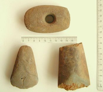 Macehead (on top) and non-flint axes on bottom in obverse view