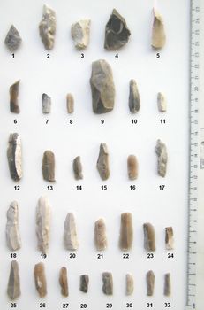 Group of lithics including arrowheads, awls/borers and blades