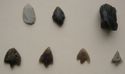 Thumbnail of Close-up of scraper (Fig 15.jpg: Row 3 no. 1), arrowhead (Fig 15.jpg: Row 3 no. 2), core (Fig 15.jpg: Row 3 no. 3), and barbed and tanged arrowheads (Fig 15.jpg: Row 4)