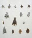 Thumbnail of Site 29 Lanshaw Delves Burley Moor: barbed and tanged arrowheads (Row 1; Row 2), fragments (Row 3 no. 1,3), Congyar Hill arrowhead (Row 3 no. 2), oblique single barb arrowhead (Row 4 no. 1), and leaf shaped arrowheads (Row 4 no. 2-4)