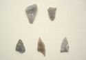 Thumbnail of Close-up of chisel arrowheads (Fig 39.jpg: Row 1) and oblique arrowheads (Fig 39.jpg: Row 2)