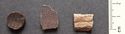 Thumbnail of Nab Hill: 1. leather? disc (obverse), 2. pottery sherd (obverse), 3. rim? sherd (obverse)