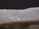 Thumbnail of High Brown Knoll: denticulate flake (close-up of worked edge)