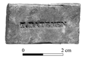 Thumbnail of Figure 08 from the full written report. Lead Plaque from Barrow 2, demarking Thomas Bateman's 1848 excavation.