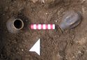 Thumbnail of Figure 11.11: Bainesse Cemetery: placed Trier black-slip beakers in Grave 219.