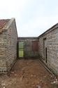 Thumbnail of Boundary wall and door between South and West Ranges
