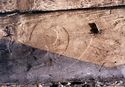 Thumbnail of Sample 16/1999 taken from a trefoil ended stalk in shallow relief shows a thin yellowish layer over a white lead ground over a shiny charcoal black layer - location