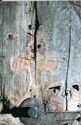 Thumbnail of Detailed views in raking light of some of the original painted decoration that is a cross botonny inside a band of four grooves now showing as relief within the weathered timber surface:  south 