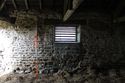 Thumbnail of Blocked doorway in west wall of Room G2. Scale 1 x 2 m.