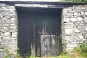 Thumbnail of The threshing doors in the east elevation of Barn 1; from the east.