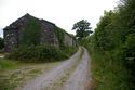 Thumbnail of Wider angled view of the barn range and farm lane; from the south-east.