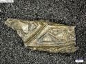 Thumbnail of Catalogue 687 (K1972). Silver-gilt fragment, cast interlace and scroll. Not scaled. 