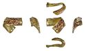Thumbnail of Working image for catalogue no. 509. Gold mount from tip of hilt-guard, garnet cloisonné 
