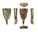 Thumbnail of Working image for catalogue no. 522. Gold mount, tongue-shaped with animal head and garnet cloisonné 