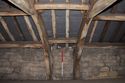 Thumbnail of South-west side of first floor, showing closely spaced upper cruck trusses and short purlins