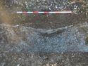 Thumbnail of North facing section of linear feature [12706]. 1x1m scale. Plate 6 of report, Ref: 107320.02