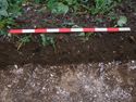 Thumbnail of South facing representative section of Trench 128. 1x1m scale. Plate 4 of report, Ref: 107320.02