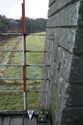Thumbnail of W end of parapet, top-rail forming PU1, old rail fixings in X3, and HU1 Report plate 122.