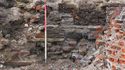 Thumbnail of West wall of 3017 and detail of staircase folliowing excavation, from E with 1m scale