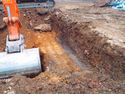 Thumbnail of Digging for lift shaft, test pit 16 (start) from W