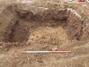 Thumbnail of Test pit 25 - view of each side of trench with 1m scale from E