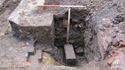 Thumbnail of N facing section of slot in Trench H & big block & Iron spike, with 2m scale