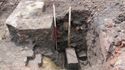 Thumbnail of N facing section of slot in Trench H & big block & Iron spike, with 1m scale