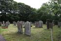 Thumbnail of Graveyard within the former chapel site with a 17th century sundial