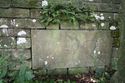 Thumbnail of Foundation stone of the 1812 chapel within the northern boundary wall of the graveyard