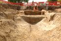 Thumbnail of Possible Latrine Structure 210 (After North Side Removed) And Wall 212 Dug Into Late Medieval Or Early Tudor Ditch Fills 229, 219, 218, 217 And 216