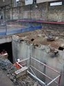 Thumbnail of Petrol tank and bund wall truncating the Milk Ramp during dismantling