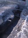 Thumbnail of Trench 2. Looking north. Concrete and wood structure [204] with building 17b in background