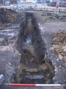 Thumbnail of Trench 6. Southern end of trench looking north. Concrete encased water main [604] in foreground