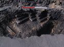 Thumbnail of Trench 5. Brick foundataions of SE corner of 1906 engine shed [503] from east