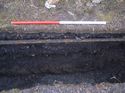Thumbnail of Trench 4. Section looking south showing makeup layer (404) over natural clay (405)