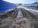 Thumbnail of Trench 11. Base of trench looking north. Showing recent madeground deposit (1101) over natural clay (1102)