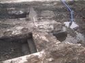 Thumbnail of Trench 12. West end of inspection pit [1244/1245] showing floor (1217) and walls [1209] and [1208] from north