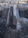 Thumbnail of Trench 12. Inspection pit [1243]. Looking north showing west end of pit and metal pipe