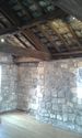 Thumbnail of Top floor of Micklegate Bar, looking east, showing tie beam, rafter, purlin, minor purlin, common rafters, battens and underside of slates.