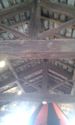 Thumbnail of Top floor of Micklegate Bar, looking north east, showing tie beams, king posts, struts, rafters, purlins, common rafters, battens and underside of slates.