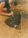 Katie Lister excavating Neolithic pottery in Int 50, 1991