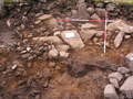 Thumbnail of Collapsed kerb stones with pit 2