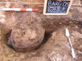 Thumbnail of Urn in pit 2 under excavation